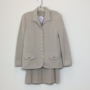 Three piece skirt suit. Size 8 tan color vintage